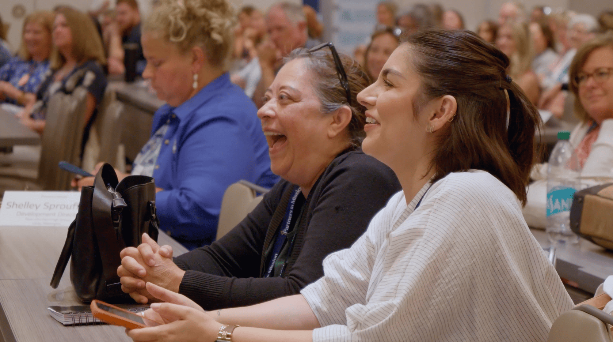 Conference Highlight Reel Attendees Laughing